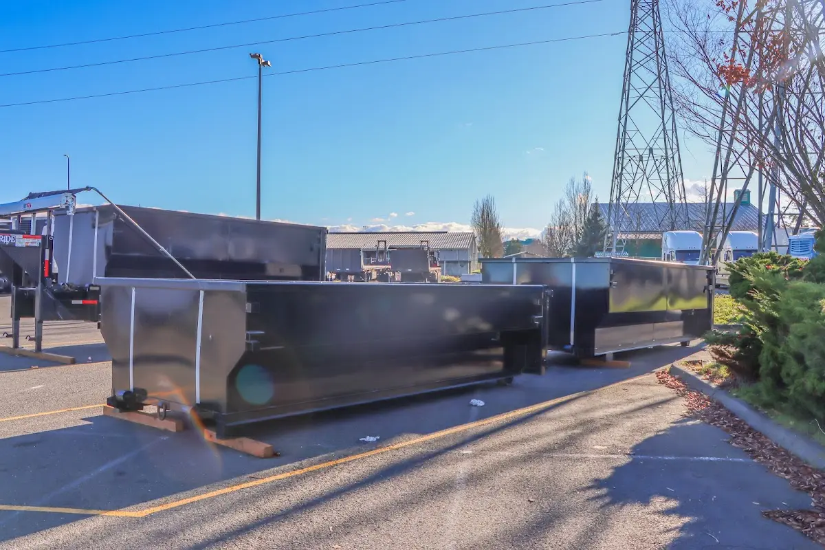 Roll-off dumpster ready for waste disposal at job site for Cleanout Dumpster Rental in Elon